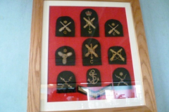 0331-Pine-Framed-Display-of-Cloth-Regimental-Badges