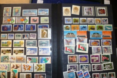 041-Stamp-Album-containing-World-and-Mint-Used-Stamps