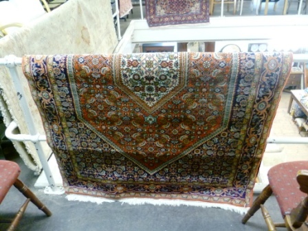 459-Oriental-Red-Base-Coloured-Rug-with-Patterned-Details-approx.-1.8m-x-1.2m