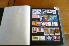 0024-Large-Stamp-Album-containing-Assorted-Stamps