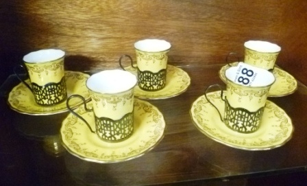0188-5-Coalport-Coffee-Cups-and-Saucers-with-Hallmarked-Silver-Holders