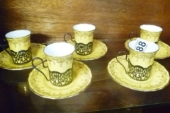 0188-5-Coalport-Coffee-Cups-and-Saucers-with-Hallmarked-Silver-Holders