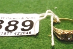 389-Gold-Ring-with-3-Pale-Blue-Stones